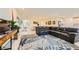 Open concept living room and dining area featuring modern furnishings and decor at 2705 Cava Tirreni St, Henderson, NV 89044