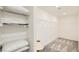 Spacious walk-in closet with carpet floors and metal shelving at 2705 Cava Tirreni St, Henderson, NV 89044