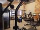 Modern fitness center with treadmills, ellipticals, and weight machines at 223 Hunter Ridge Rd # A202, Brian Head, UT 84719