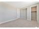 Simple bedroom with carpet flooring and closet at 7151 Serene Creek St, Las Vegas, NV 89131