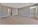 Bright and airy bedroom with plush carpeting at 7151 Serene Creek St, Las Vegas, NV 89131