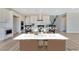 Bright, spacious kitchen with an island and modern appliances at 7151 Serene Creek St, Las Vegas, NV 89131