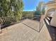 Balcony view to the tree tops and mountains beyond with a metal railing, for enjoying the outdoors at 2089 Avalon Dr, Laughlin, NV 89029