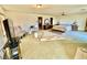 Spacious bedroom with ceiling fan, closet, and adjacent seating area at 2089 Avalon Dr, Laughlin, NV 89029