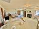 Spacious bedroom with ceiling fan, fireplace and large mirror at 2089 Avalon Dr, Laughlin, NV 89029