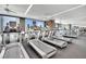 Modern gym with multiple treadmills and large windows at 4381 W Flamingo Rd # 1901, Las Vegas, NV 89103