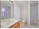 Bright bathroom featuring single vanity, toilet and shower at 6990 W Richmar Ave, Las Vegas, NV 89178