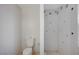 Bright bathroom featuring toilet and shower at 6990 W Richmar Ave, Las Vegas, NV 89178
