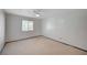 Bright bedroom featuring a ceiling fan, window, and light-colored walls at 6990 W Richmar Ave, Las Vegas, NV 89178
