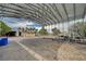 Wide shot of the property, showing a large storage area with a metal covering at 6990 W Richmar Ave, Las Vegas, NV 89178
