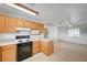 A well-lit kitchen features a microwave, dishwasher, and stove at 6990 W Richmar Ave, Las Vegas, NV 89178