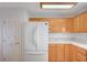 This kitchen features wood cabinets, marble counters, and stainless steel appliances at 6990 W Richmar Ave, Las Vegas, NV 89178