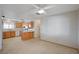 Open kitchen featuring an island and appliances, providing a functional and stylish cooking space at 6990 W Richmar Ave, Las Vegas, NV 89178