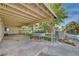Spacious covered patio area with ample room for outdoor furniture and entertaining with view of the pool at 6990 W Richmar Ave, Las Vegas, NV 89178