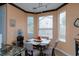 Cozy breakfast nook with bright natural light and seating for four, perfect for casual dining at 6007 Turtle River Ave, Las Vegas, NV 89156