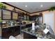 Beautiful kitchen with stainless steel appliances and granite countertops at 6007 Turtle River Ave, Las Vegas, NV 89156