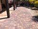 Patio featuring brick pavers, creating a charming outdoor living space at 6007 Turtle River Ave, Las Vegas, NV 89156