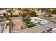 Property with pool, vacant lot, and surrounding homes at 2000 S Monte Cristo Way, Las Vegas, NV 89117