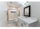 Clean bathroom with a shower/tub combo and modern vanity at 2000 S Monte Cristo Way, Las Vegas, NV 89117