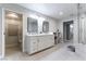 Elegant bathroom featuring a double vanity and separate toilet at 2000 S Monte Cristo Way, Las Vegas, NV 89117