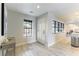 Bright entryway with gray flooring and view into kitchen at 2000 S Monte Cristo Way, Las Vegas, NV 89117