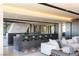 Stylish wet bar with seating and an open layout, perfect for entertaining at 4 Horseshoe Rock Ct, Henderson, NV 89012
