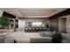 Open concept kitchen with sleek cabinets, a large island with seating and an open dining area at 4 Horseshoe Rock Ct, Henderson, NV 89012