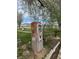 Rustic gas pump and landscaping in the front yard at 351 Bunarch Rd, Pahrump, NV 89060