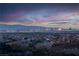 Panoramic city view of Las Vegas skyline at sunset, showcasing the vibrant cityscape and distant mountains at 348 Unicorn Hills Dr, Henderson, NV 89012