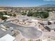 See the modern, custom home's xeriscaping, pool, and cul-de-sac location in this aerial view at 7062 Maverick St, Las Vegas, NV 89131