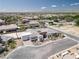 An aerial view of a desert home in a quiet neighborhood with generous lot, blue skies in background at 7062 Maverick St, Las Vegas, NV 89131