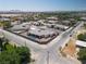 An elevated view showing the home's desert landscape, pool, and surrounding neighborhood at 7062 Maverick St, Las Vegas, NV 89131