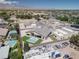 Aerial view of a well maintained desert home with a modern pool and desert surroundings at 7062 Maverick St, Las Vegas, NV 89131