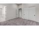 Bedroom with carpet, closet and adjacent bathroom for a private suite setup at 7062 Maverick St, Las Vegas, NV 89131