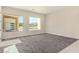 Large bonus room with large windows showcasing natural light, soft carpet, and modern design at 7062 Maverick St, Las Vegas, NV 89131
