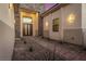 Inviting front entrance with stone accents, a walkway, and desert landscaping at 7062 Maverick St, Las Vegas, NV 89131