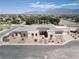 An aerial view shows the front of the modern home and the meticulously landscaped front yard at 7062 Maverick St, Las Vegas, NV 89131
