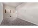Spacious living room featuring three inset wall displays, recessed lighting, and plush carpeting at 7062 Maverick St, Las Vegas, NV 89131