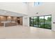 Modern kitchen with wood cabinetry and large island at 7385 Heron Canyon Ct, Las Vegas, NV 89117