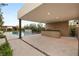 Outdoor kitchen with grill and bar area at 7385 Heron Canyon Ct, Las Vegas, NV 89117