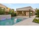 Relaxing pool area with outdoor kitchen and bar at 7385 Heron Canyon Ct, Las Vegas, NV 89117