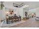 Open concept dining area with high ceilings and access to Gathering room at 9880 Dorrell Ln, Las Vegas, NV 89149