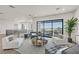 Relaxing living area with sliding doors to an outdoor deck at 9880 Dorrell Ln, Las Vegas, NV 89149