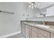 Modern bathroom with double vanity and granite countertops at 1813 Skyline Dr, Las Vegas, NV 89117