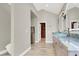 Elegant bathroom boasts double sinks, a large walk-in closet, and marble countertops at 1813 Skyline Dr, Las Vegas, NV 89117