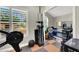 Home gym with rowing machine, weights, and mirror at 1813 Skyline Dr, Las Vegas, NV 89117