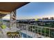 Balcony with outdoor seating and sunset city views at 3111 Bel Air Dr # 12C, Las Vegas, NV 89109