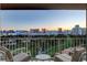 Balcony with seating overlooking golf course and city skyline at 3111 Bel Air Dr # 12C, Las Vegas, NV 89109