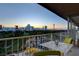 Balcony with seating and expansive views of the city skyline at 3111 Bel Air Dr # 12C, Las Vegas, NV 89109