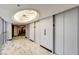 An elevator lobby with recessed lighting and a decorative ceiling medallion above the elevators at 3111 Bel Air Dr # 12C, Las Vegas, NV 89109